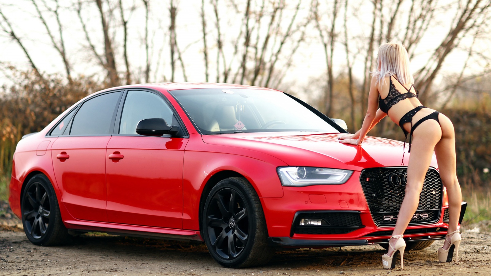 Audi A4 Quattro and bikini blonde