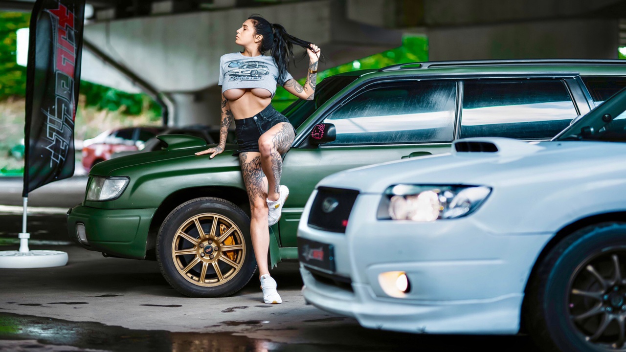 Subaru Forester and hot babe